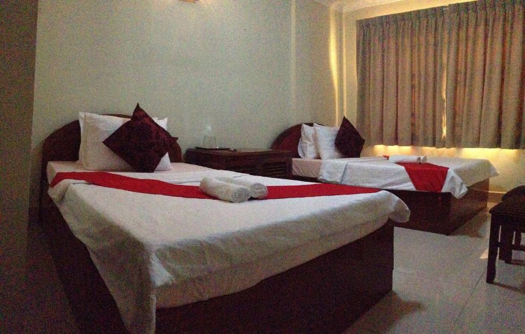 Homeland Guesthouse Пномпень Номер фото